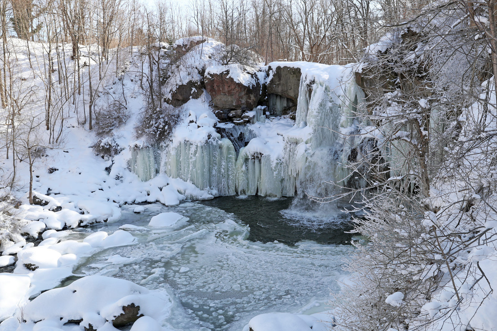 Ice forms on the the 40-foot waterfall on Murder Creek in Akron Falls Park